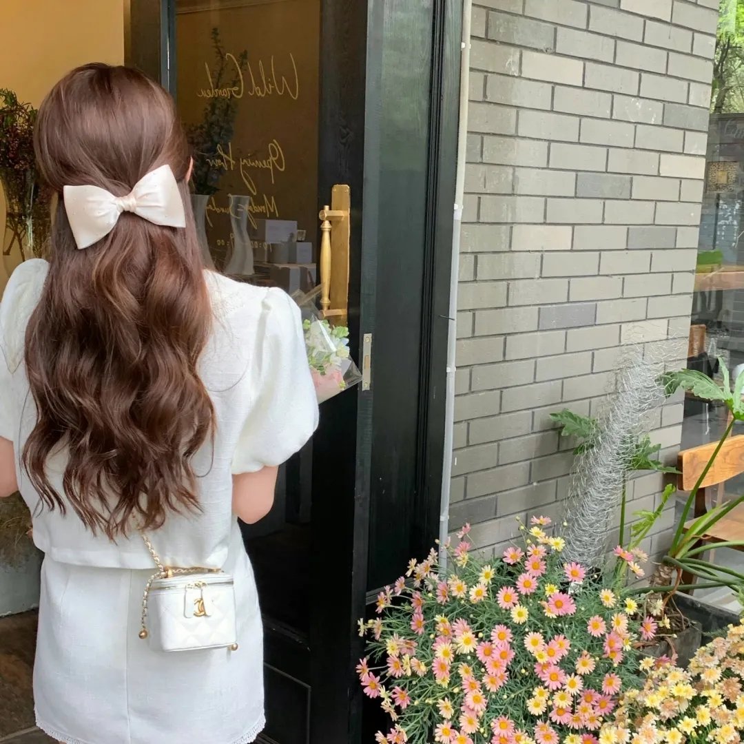 千雪一笑百媚生